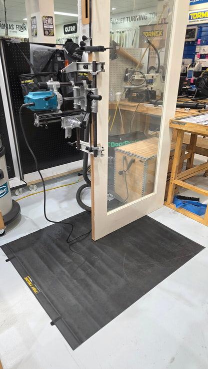 Large tidy tradie work mat protecting the floor.