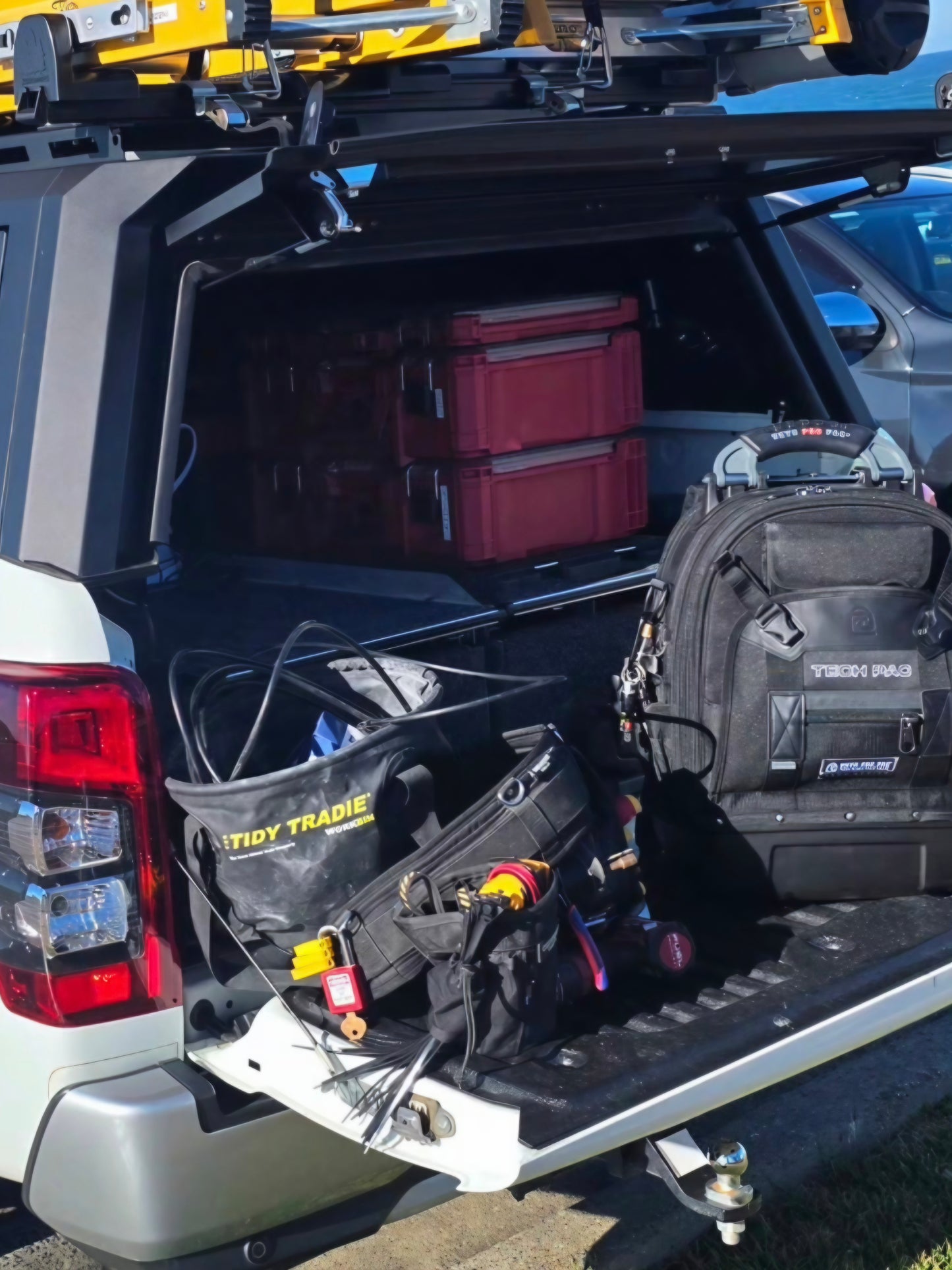 A Tidy Tradie work bin in an electricians vehicle.