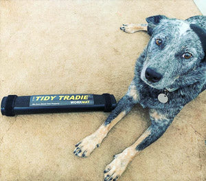 Dog protecting a small tidy tradie work mat
