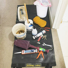 Load image into Gallery viewer, Medium size Tidy Tradie work mat protects the floor from plumbing tools.
