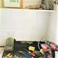 Electrician work mat for protecting the customers kitchen bench top.