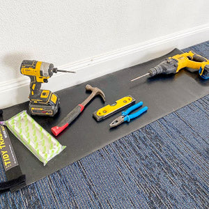 Electricians tools placed on top of a small tidy tradie work mat