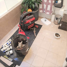 Load image into Gallery viewer, Medium size Tidy Tradie work mat, used by a plumber to protect the floor tiles.
